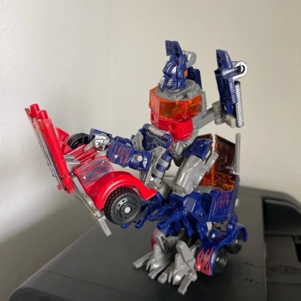 Hasbro Transforming Robot - Red, Blue, and Silver